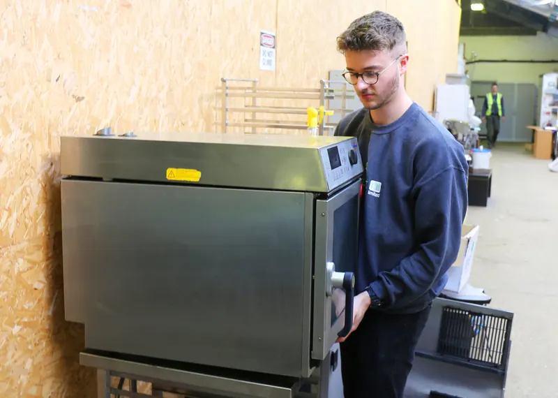 Commercial kitchen equipment being removed